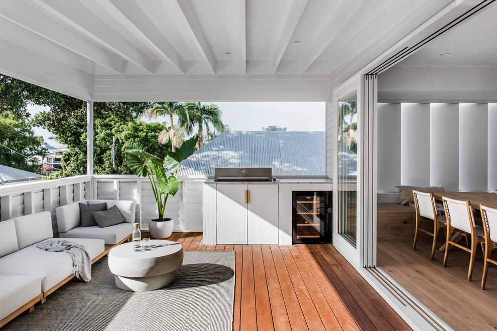 Inspiration for a coastal terrace in Brisbane with a roof extension.