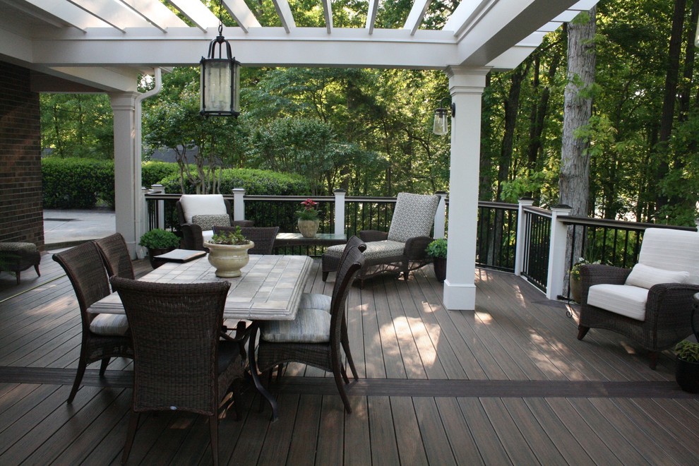 This is an example of an expansive classic back terrace in Atlanta.