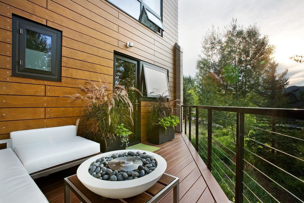 Example of a small trendy deck design in Denver with no cover