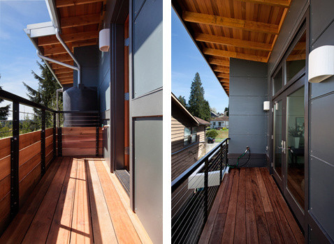 Idee per una terrazza minimal di medie dimensioni e nel cortile laterale con fontane e un tetto a sbalzo