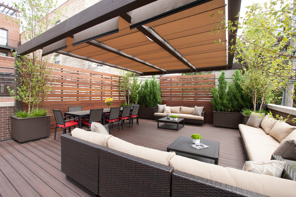 Inspiration for a contemporary terrace in Chicago with a pergola and fencing.