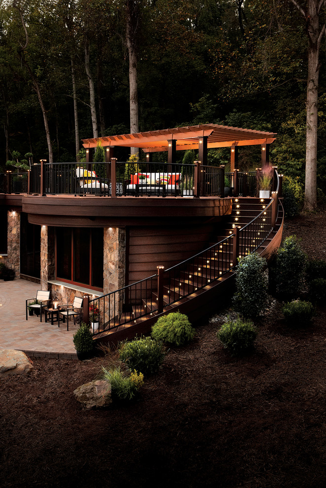 Example of a mountain style rooftop deck design in DC Metro with a pergola
