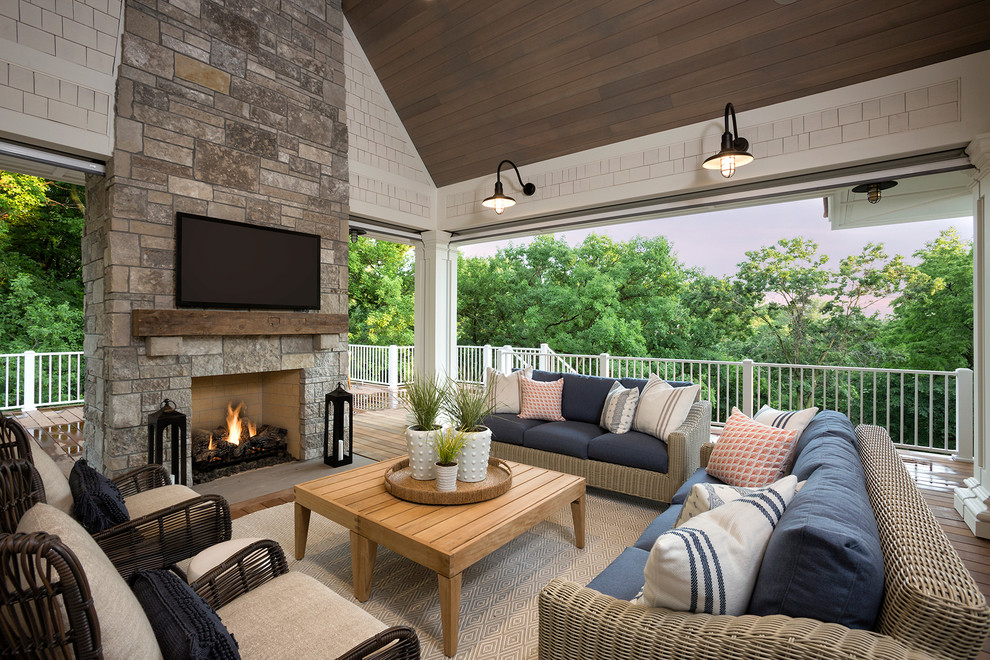 Photo of a beach style terrace in Minneapolis with a fire feature.