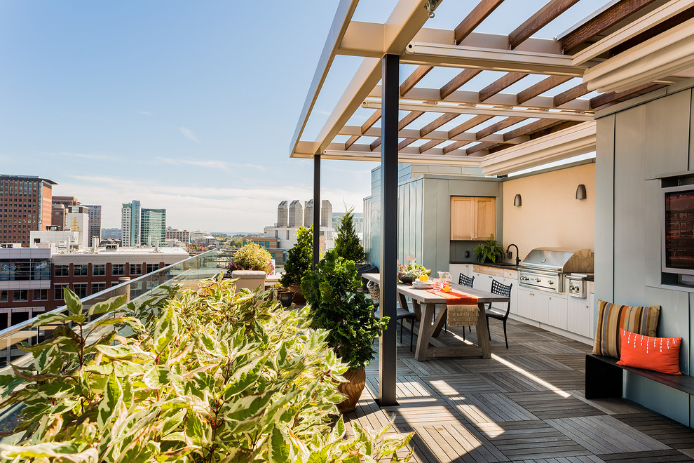 Photo of a contemporary roof rooftop terrace in Boston with a pergola and a bbq area.