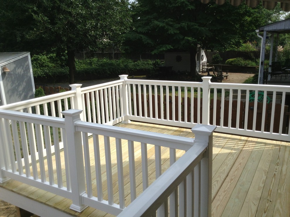 Small 12x12 Deck with walkway above basement stairs. Deck
