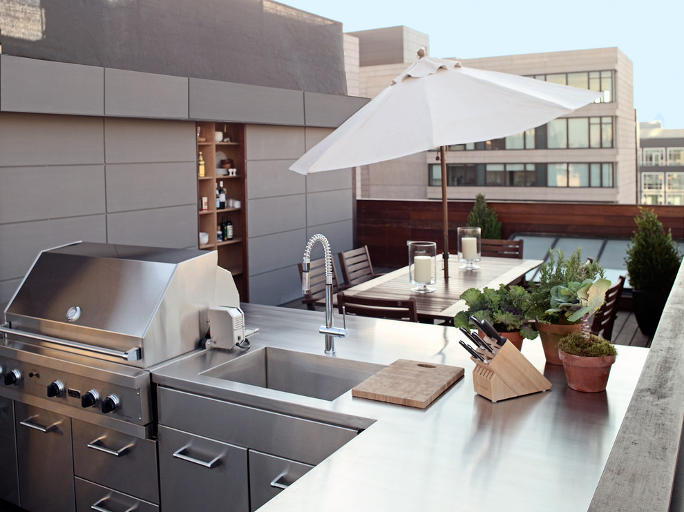 Photo of a modern terrace in New York with a bbq area.