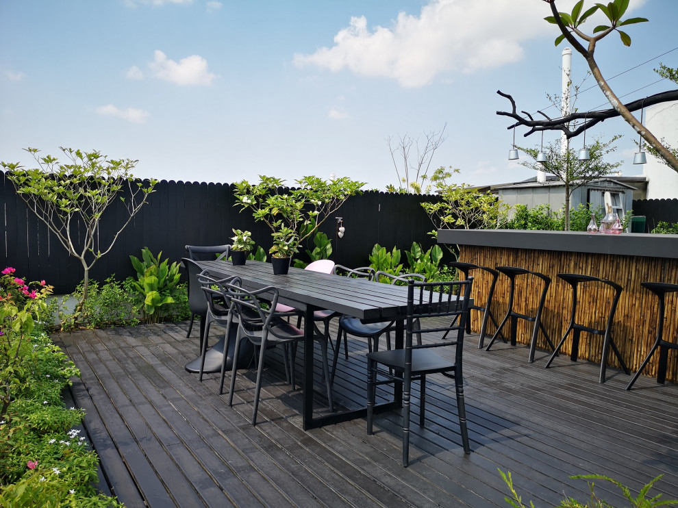 This is an example of a world-inspired roof rooftop terrace in Singapore with no cover.