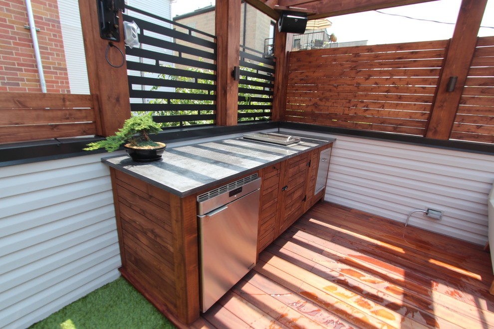 Medium sized modern roof terrace in Chicago with an outdoor kitchen and a pergola.