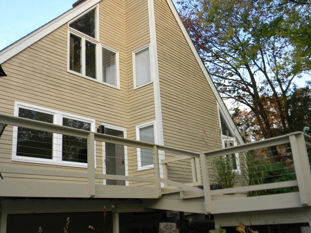 Immagine di una grande terrazza minimal nel cortile laterale con nessuna copertura