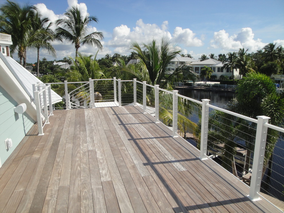 Large coastal roof terrace in Miami with no cover.