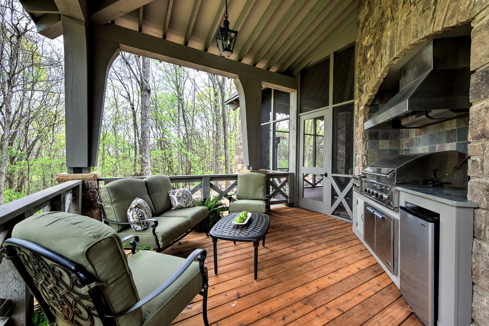 Rustic terrace in Nashville with a roof extension and a bbq area.