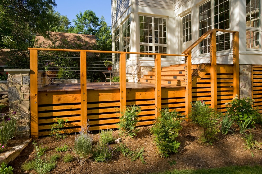 Photo of a traditional back terrace in DC Metro with no cover and skirting.