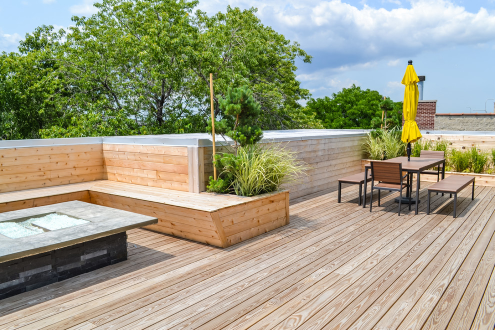 Design ideas for a large contemporary roof rooftop terrace in Chicago with a fire feature and no cover.