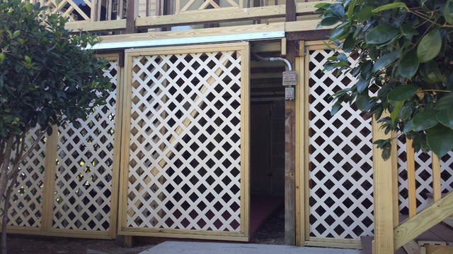 Take a Look at this Sliding Lattice Door for Under Deck Storage ...