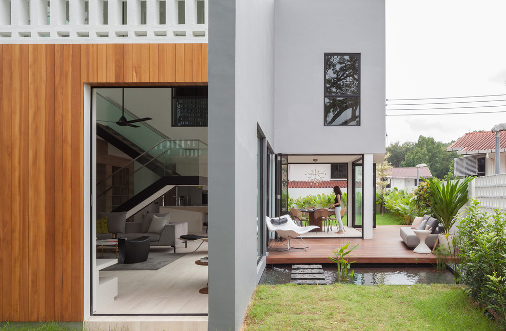 Unbedeckte Moderne Terrasse neben dem Haus in Singapur