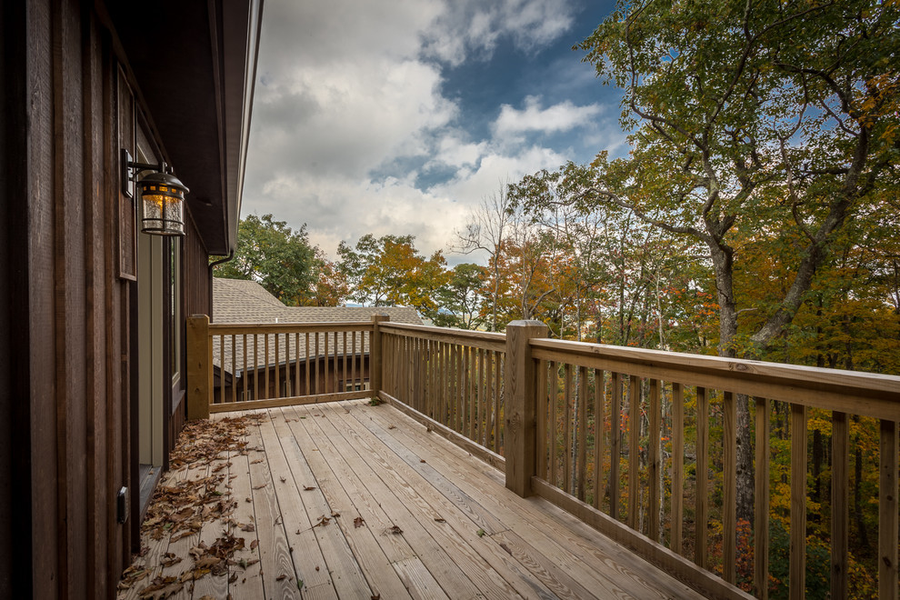 Photo of a large rustic side terrace in Charlotte with no cover.