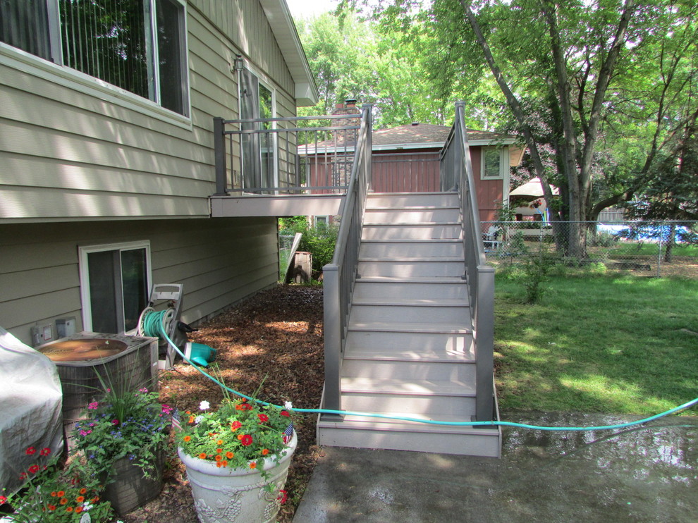 Mid-sized elegant backyard deck photo in Minneapolis with no cover