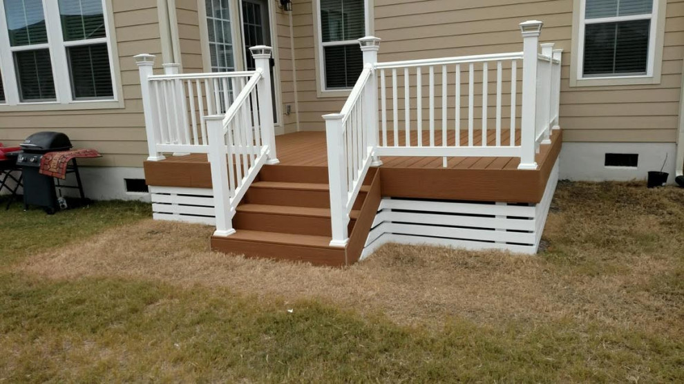 Trex composite deck with white vinyl railings and lighted top caps ...