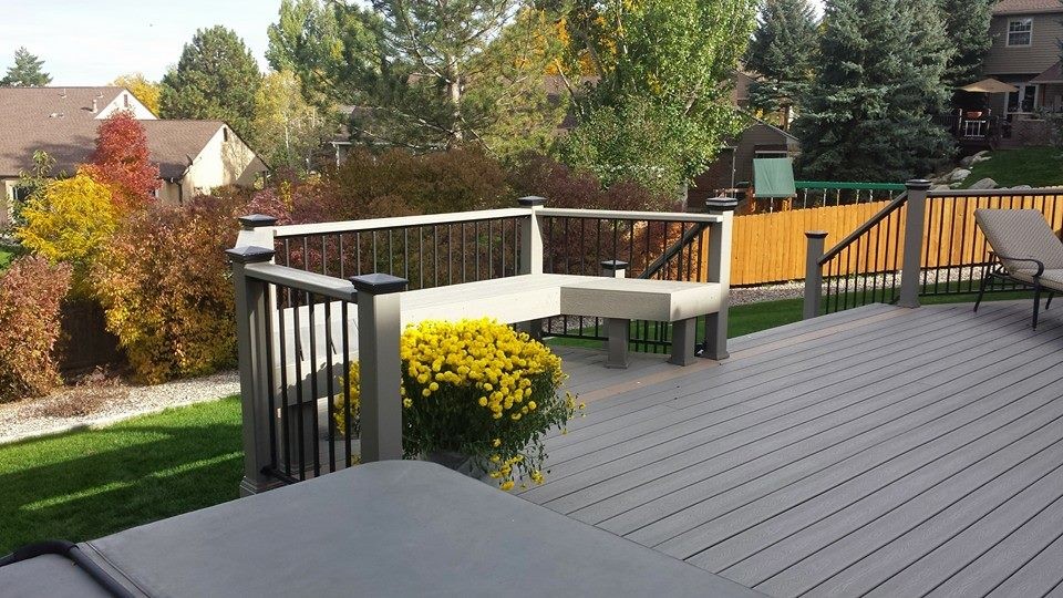 Mid-sized elegant backyard deck photo in Denver with no cover