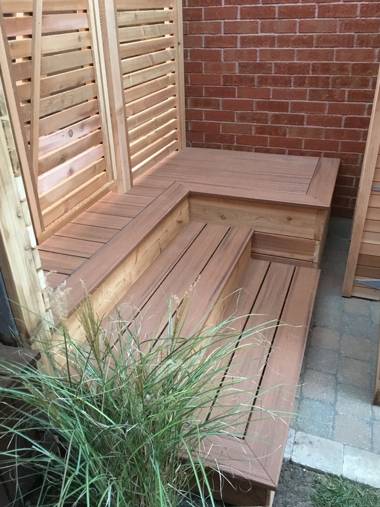 TREX floor and cedar storage, pannels and doors Contemporary Deck