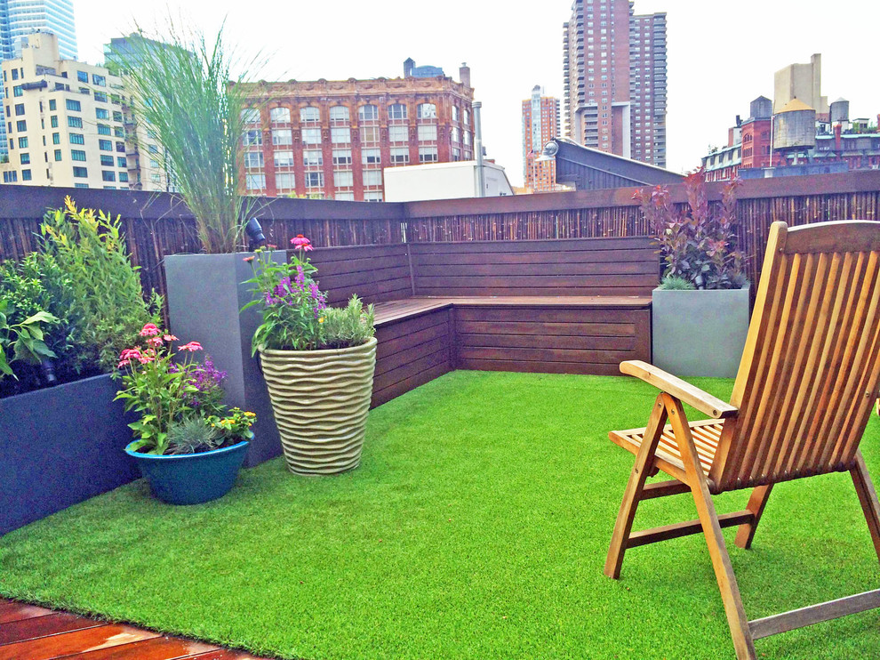 Imagen de terraza contemporánea en azotea con jardín de macetas
