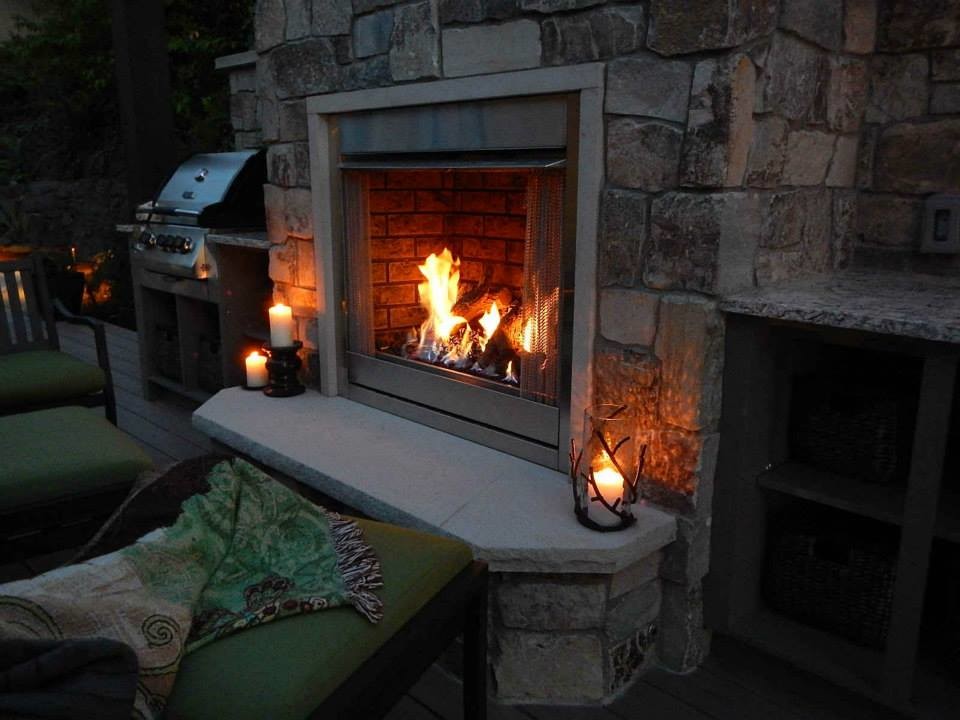 Elegant deck photo in Seattle with a fire pit