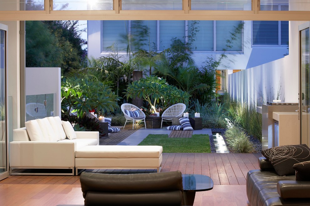 Contemporary back terrace in Sydney with a bbq area.