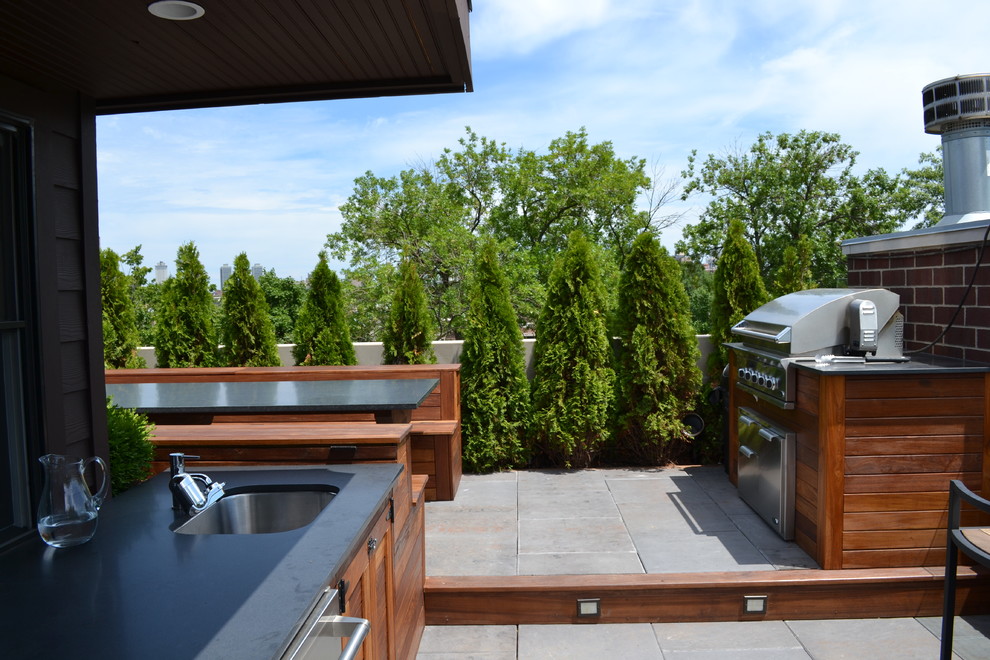 Large contemporary roof terrace in Chicago with an outdoor kitchen and a pergola.