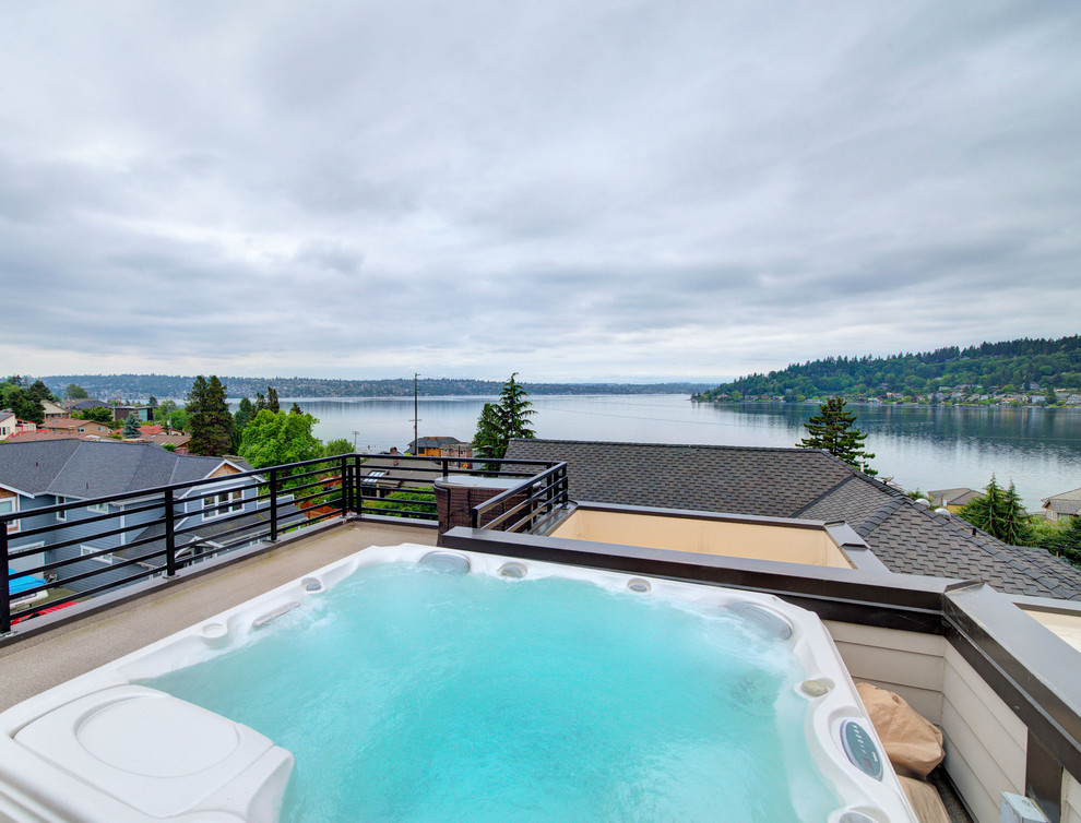 Photo of a large contemporary roof swimming pool in Seattle.