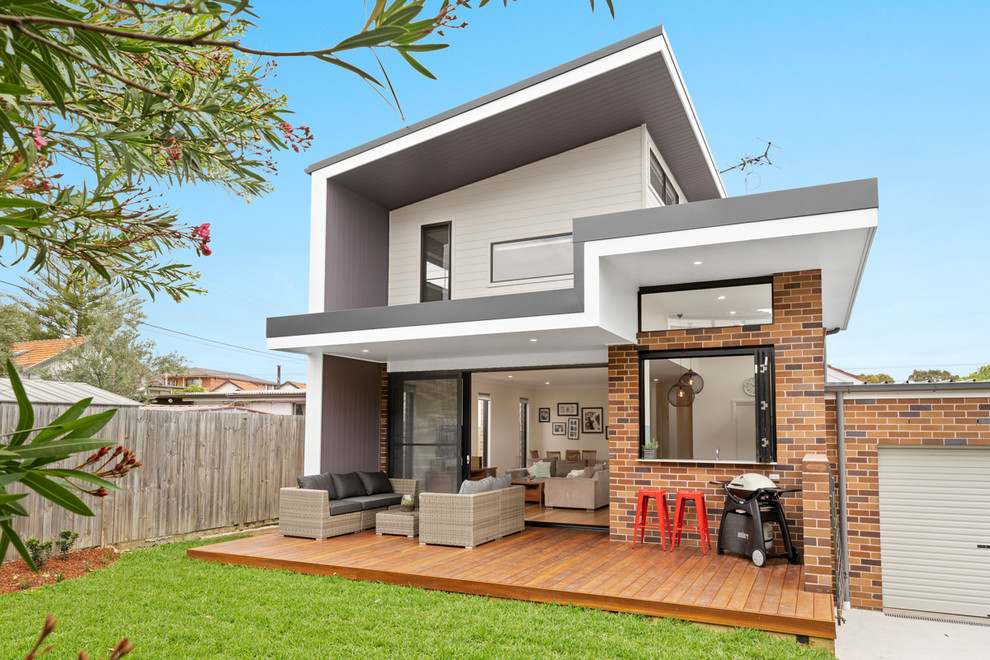 Mittelgroße, Überdachte Moderne Terrasse hinter dem Haus in Sydney