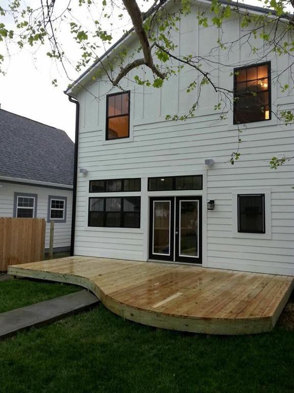 Medium sized rural back terrace in Indianapolis with no cover.