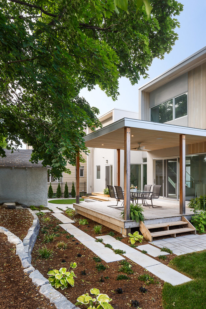 This is an example of a medium sized contemporary back terrace in Ottawa.