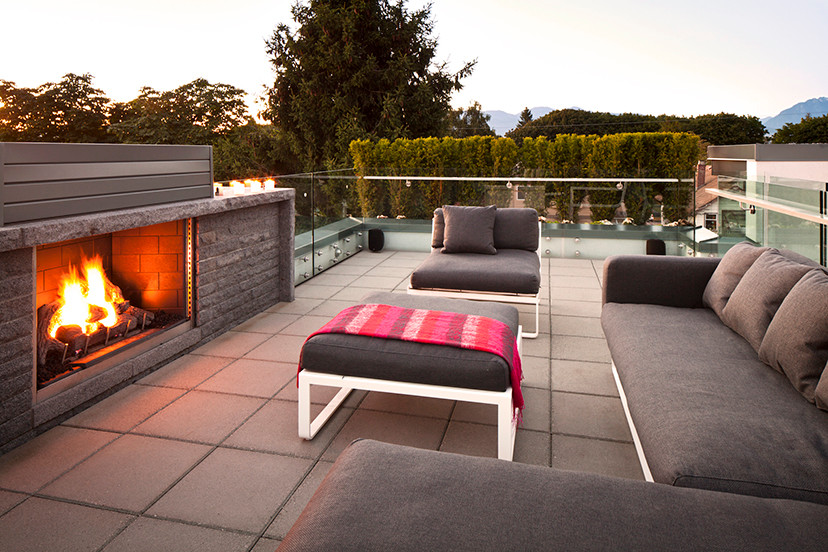 Deck - mid-sized contemporary rooftop deck idea in Vancouver with a fire pit and no cover