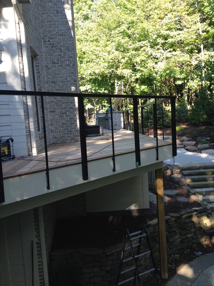 Large contemporary back terrace in Indianapolis with an outdoor kitchen.
