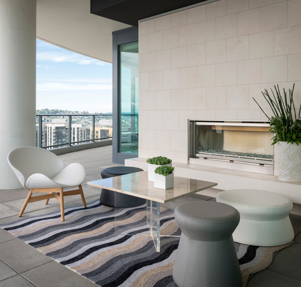 Design ideas for a contemporary terrace in Seattle with a fire feature and a roof extension.