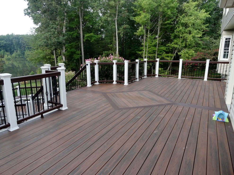 Inspiration for a large timeless backyard deck remodel in DC Metro with no cover
