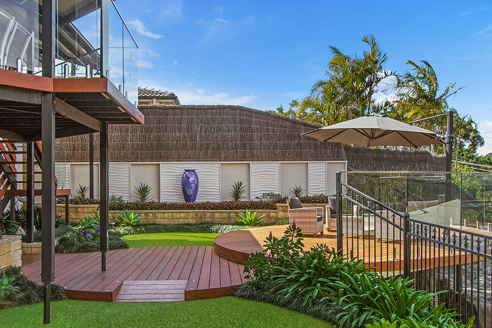 This is an example of a medium sized modern back terrace in Central Coast.