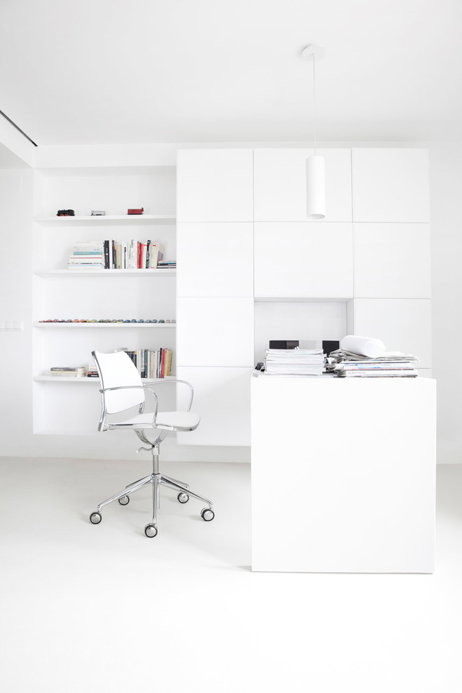 Mid-sized trendy freestanding desk study room photo in Other with white walls and no fireplace