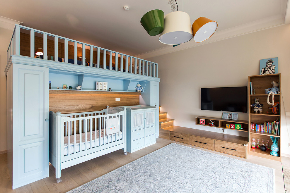 Large contemporary toddler’s room for boys in Moscow with grey walls.