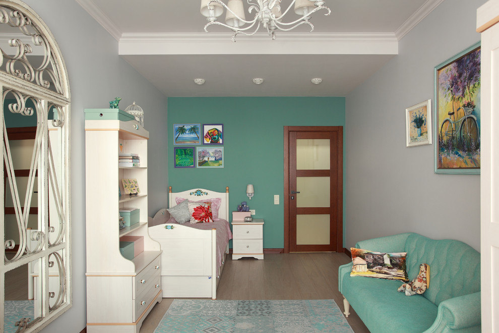 This is an example of a medium sized farmhouse teen’s room for girls in Other with multi-coloured walls, laminate floors and beige floors.