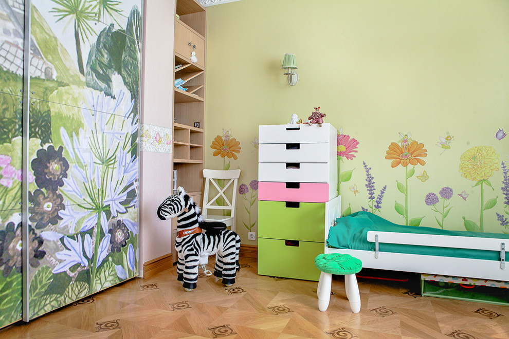 Example of a mid-sized minimalist girl light wood floor and beige floor childrens' room design in Moscow with multicolored walls