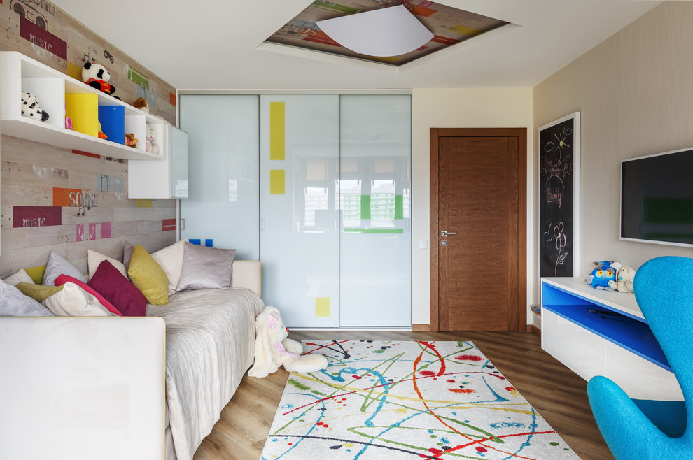Aménagement d'une chambre d'enfant de 4 à 10 ans contemporaine de taille moyenne avec un mur blanc, un sol en vinyl et un sol beige.