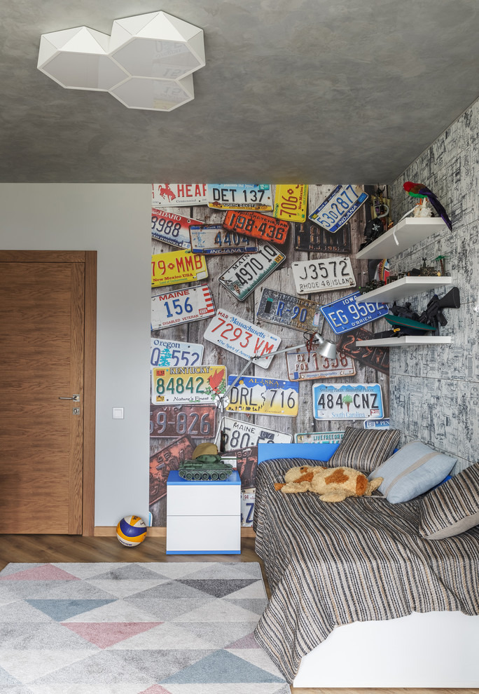 Inspiration pour une chambre d'enfant design de taille moyenne avec un mur blanc, moquette et un sol multicolore.