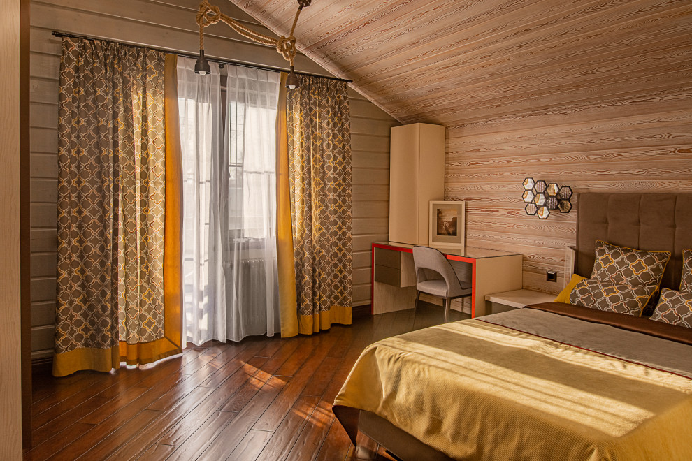 Exemple d'une chambre d'enfant tendance de taille moyenne avec parquet foncé et un sol marron.