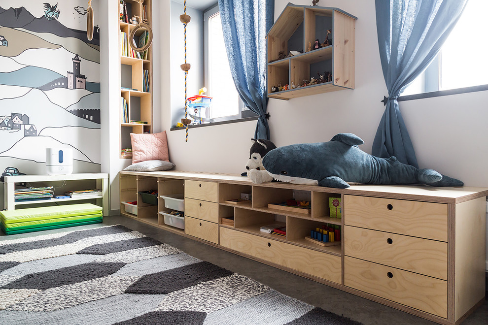 Scandi gender neutral kids' bedroom in Saint Petersburg with multi-coloured walls and grey floors.