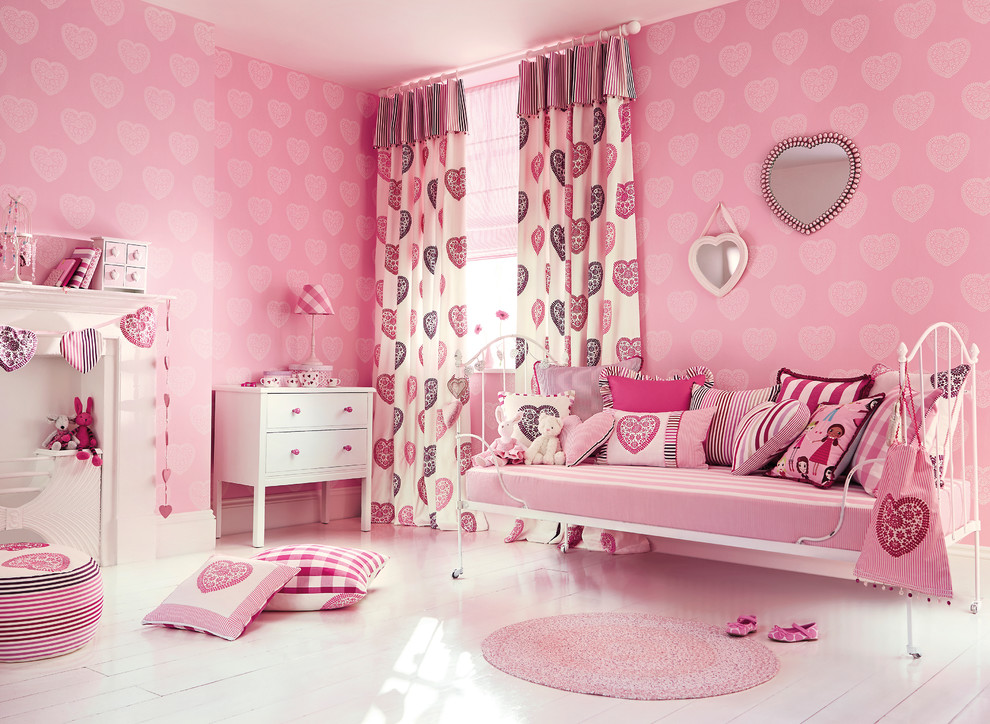 На фото: детская в современном стиле с спальным местом, розовыми стенами, деревянным полом и белым полом для девочки с