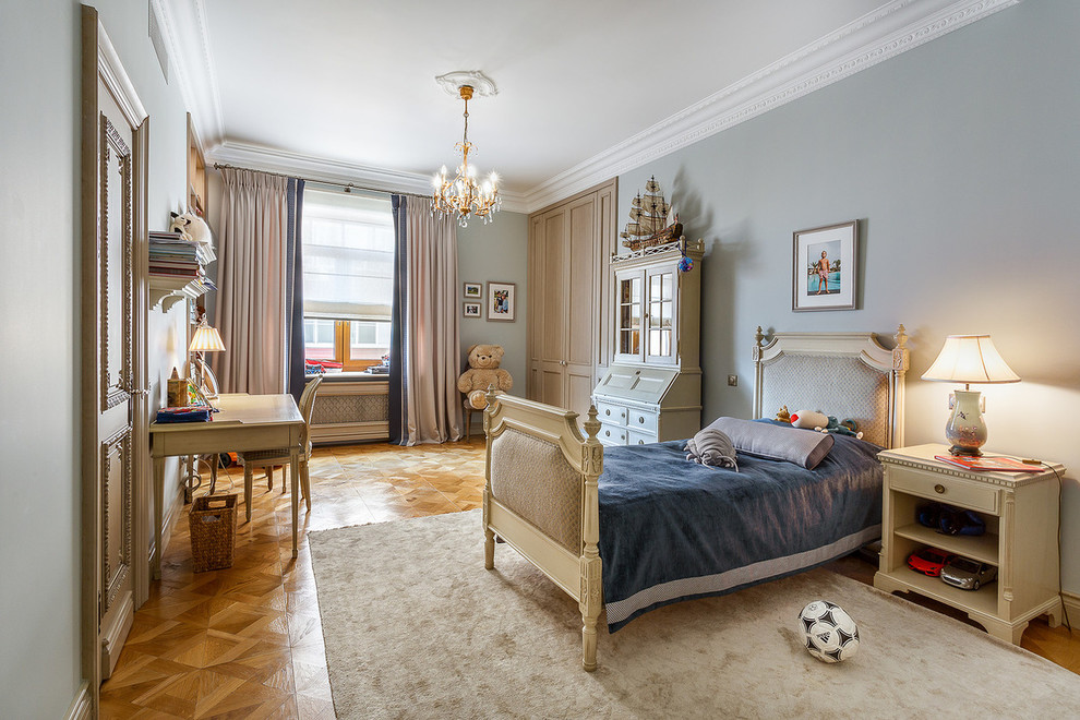Large elegant boy medium tone wood floor kids' room photo in Moscow with gray walls