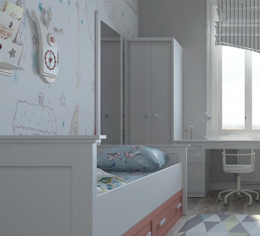 Diseño de habitación de niña de 4 a 10 años contemporánea de tamaño medio con escritorio, paredes blancas, suelo de madera clara y suelo gris