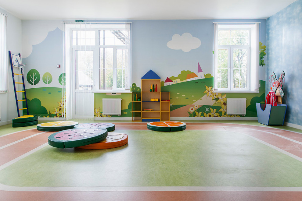 Стильный дизайн: большая нейтральная детская с игровой в современном стиле с синими стенами, полом из линолеума и разноцветным полом для ребенка от 4 до 10 лет - последний тренд