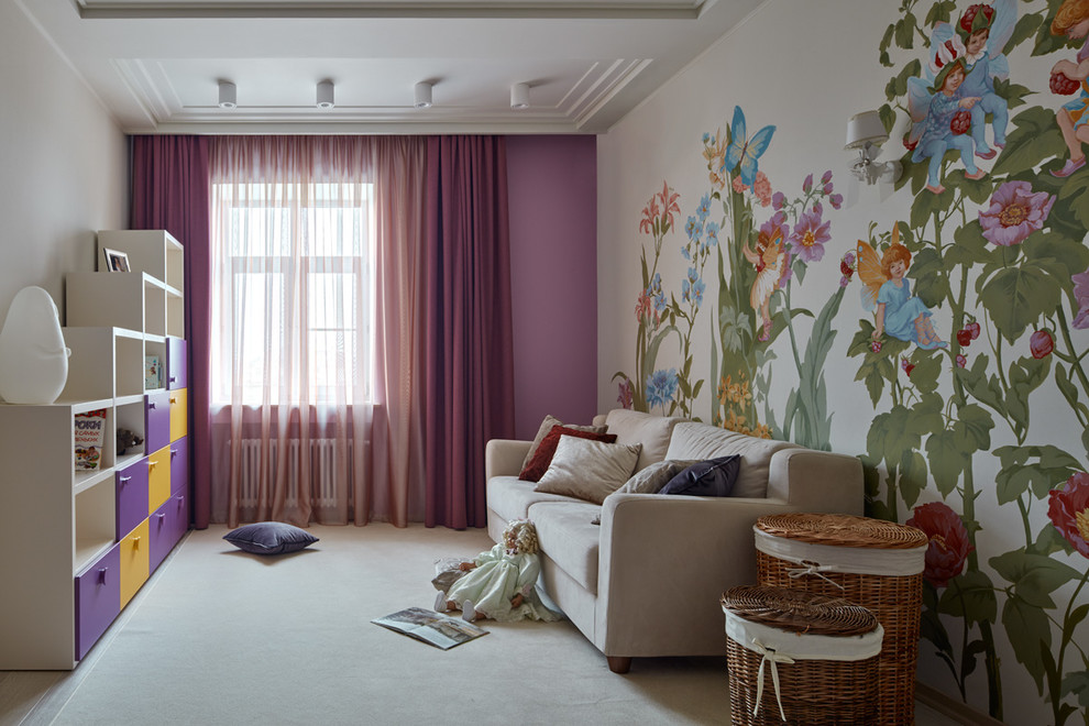 Immagine di una cameretta per bambini da 4 a 10 anni contemporanea di medie dimensioni con moquette e pareti multicolore